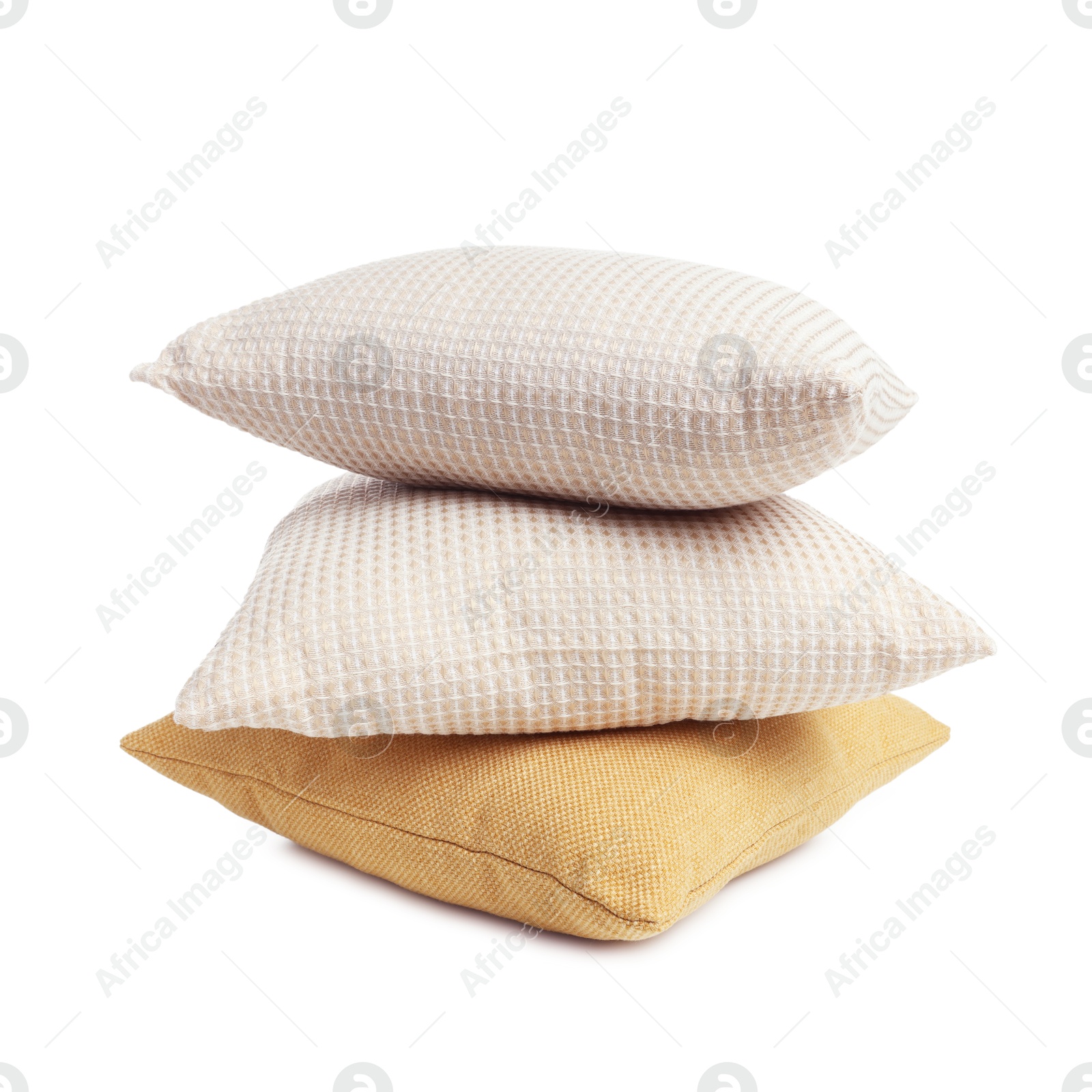 Photo of Stack of different pillows isolated on white