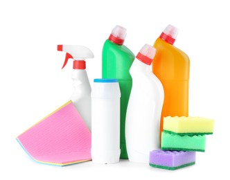 Photo of Different toilet cleaners, stack of sponges and rags isolated on white