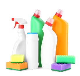 Photo of Different toilet cleaners and stacks of sponges isolated on white