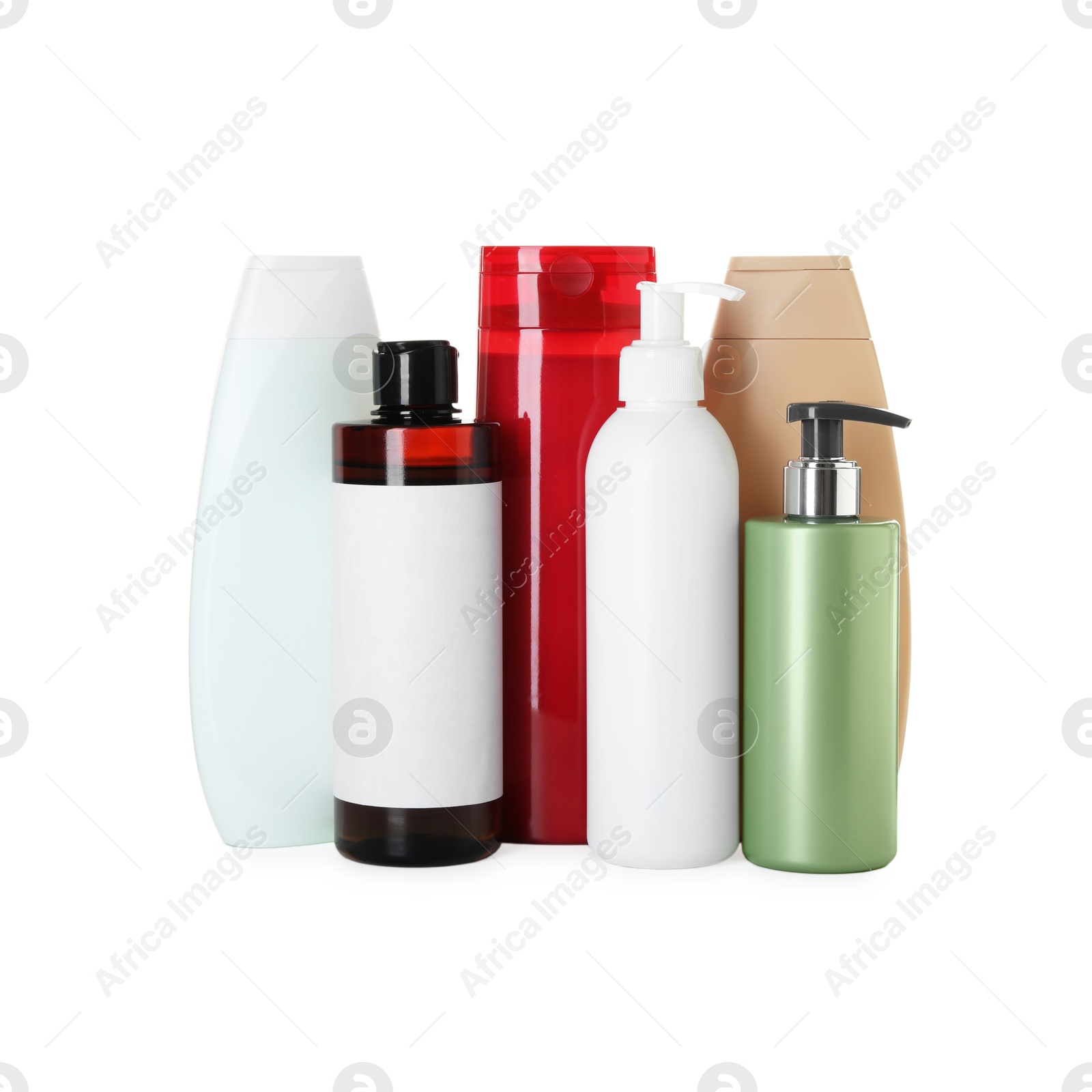 Photo of Many different bottles of shampoo isolated on white