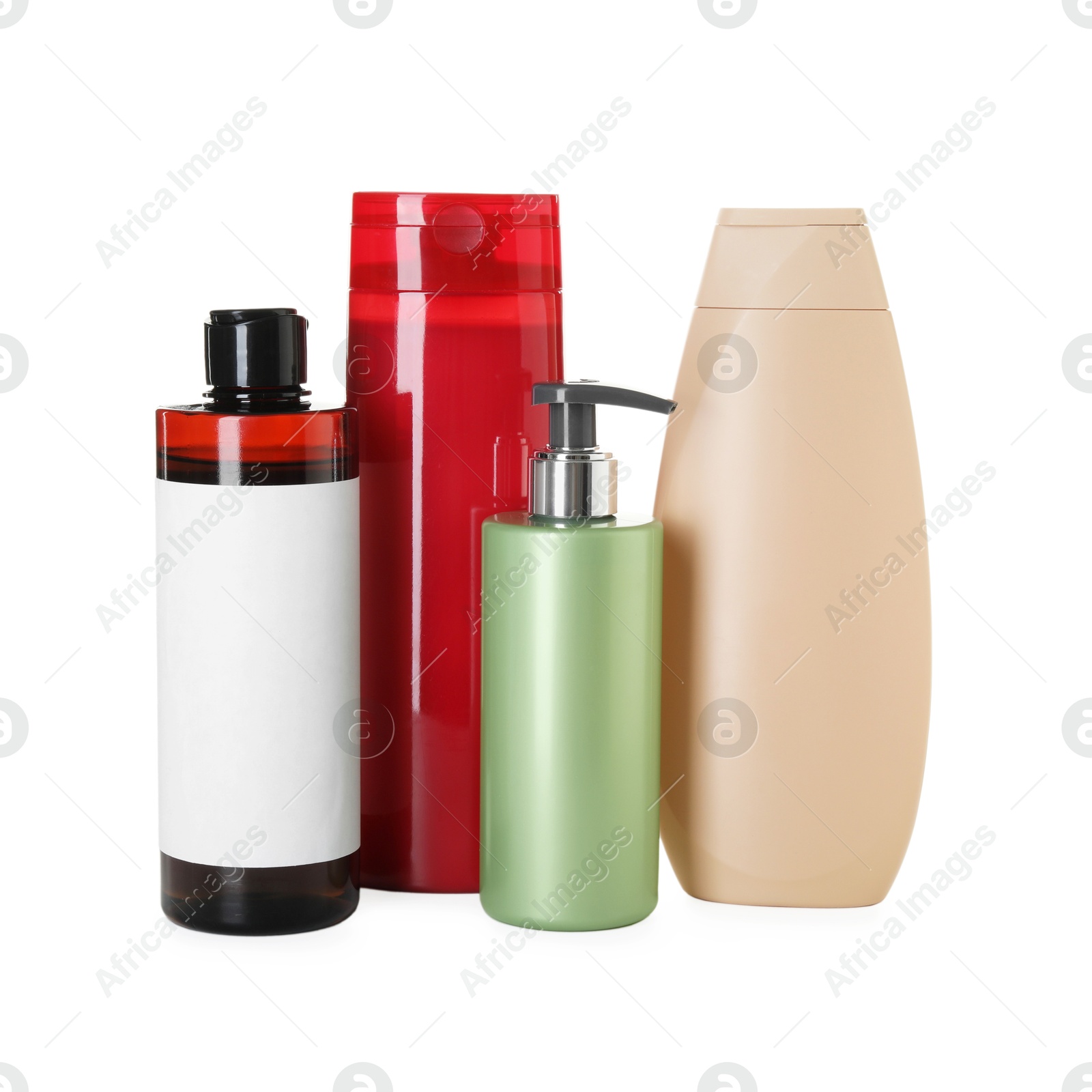 Photo of Many different bottles of shampoo isolated on white