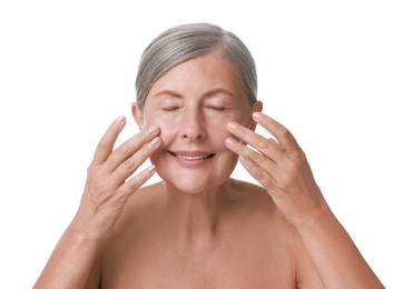 Photo of Beautiful woman doing facial massage on white background