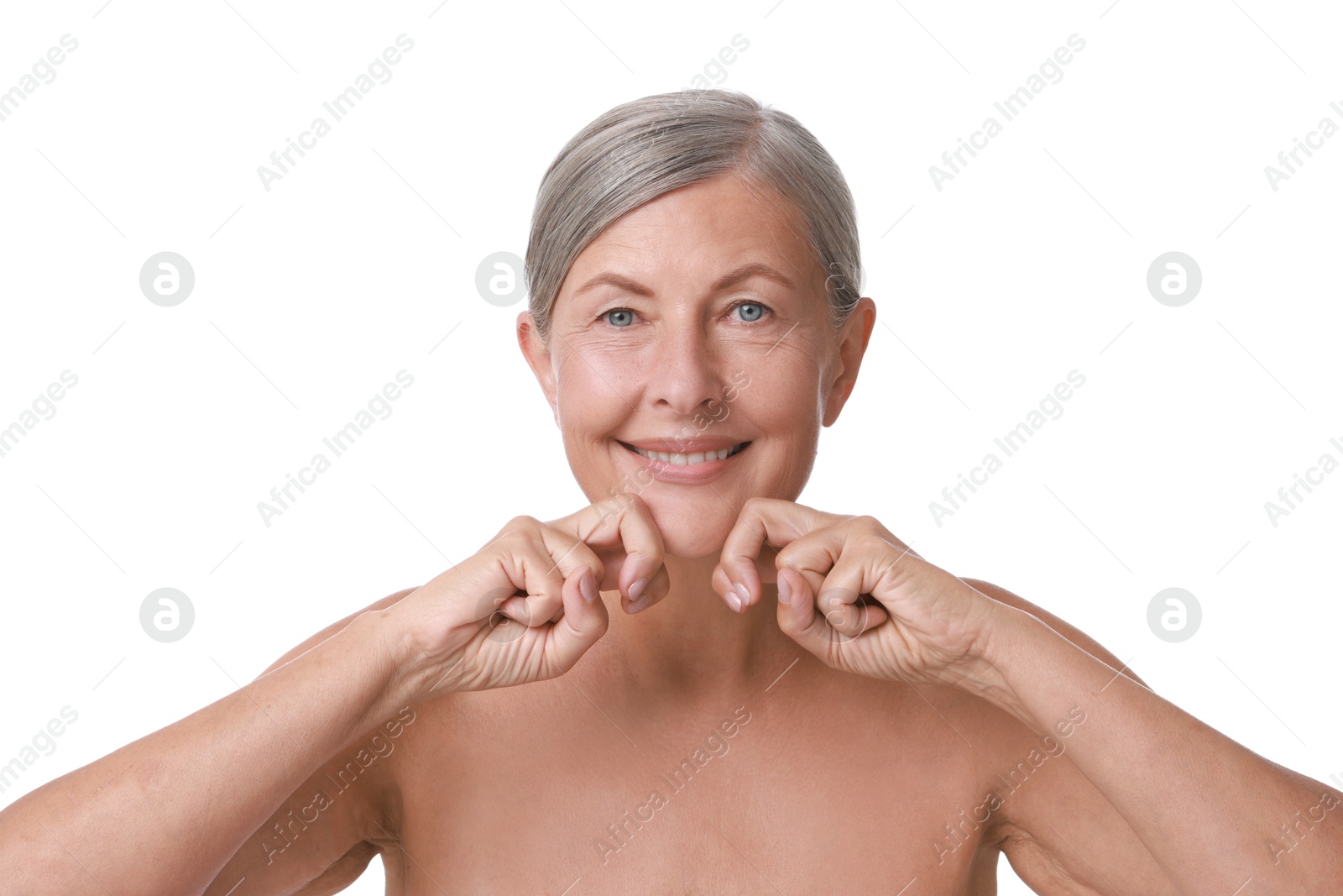 Photo of Beautiful woman doing facial massage on white background