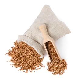 Raw buckwheat in burlap with scoop isolated on white, top view