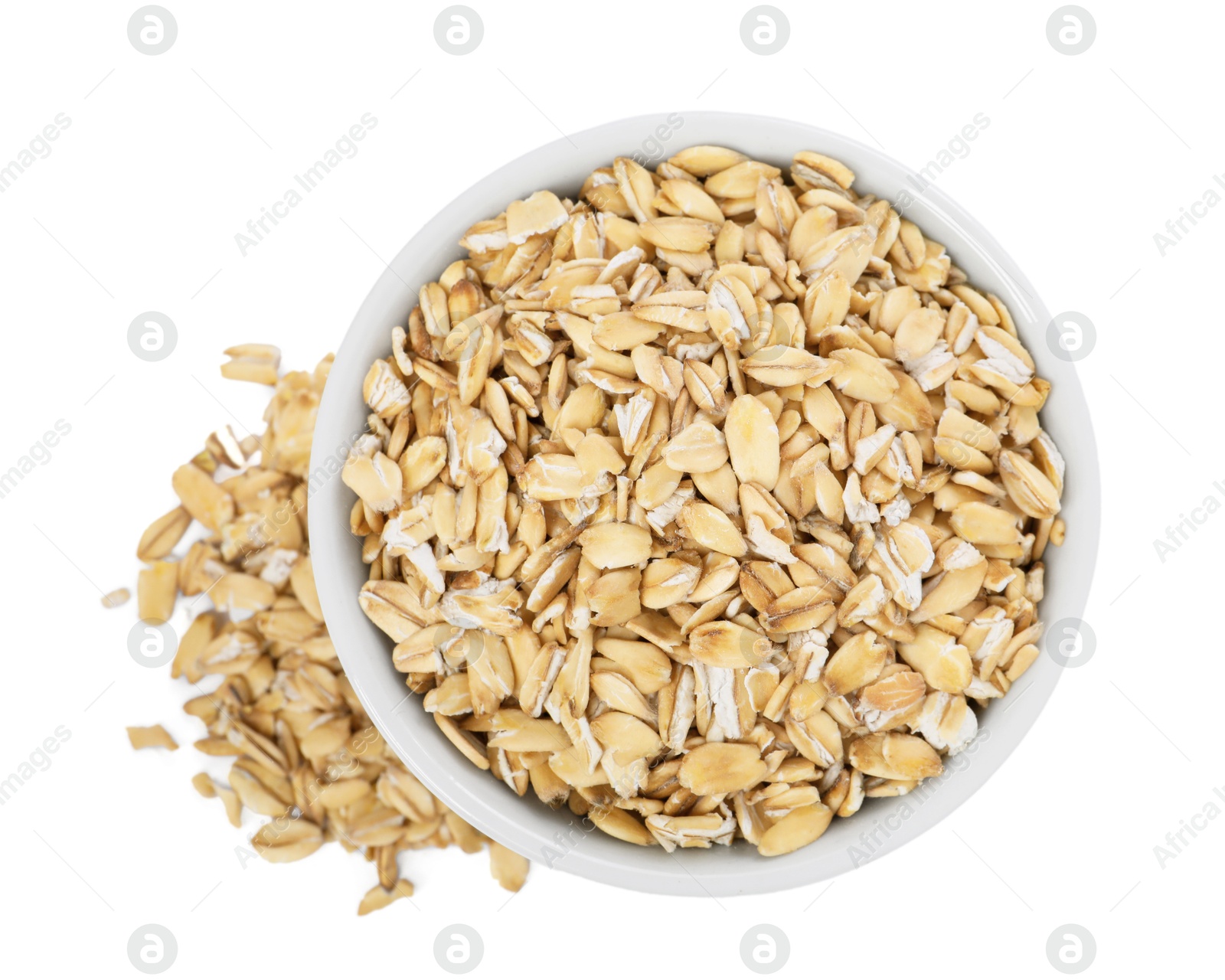 Photo of Dry oat flakes in bowl isolated on white, top view