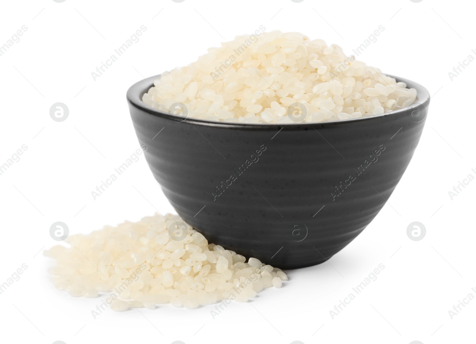 Photo of Raw rice in bowl isolated on white