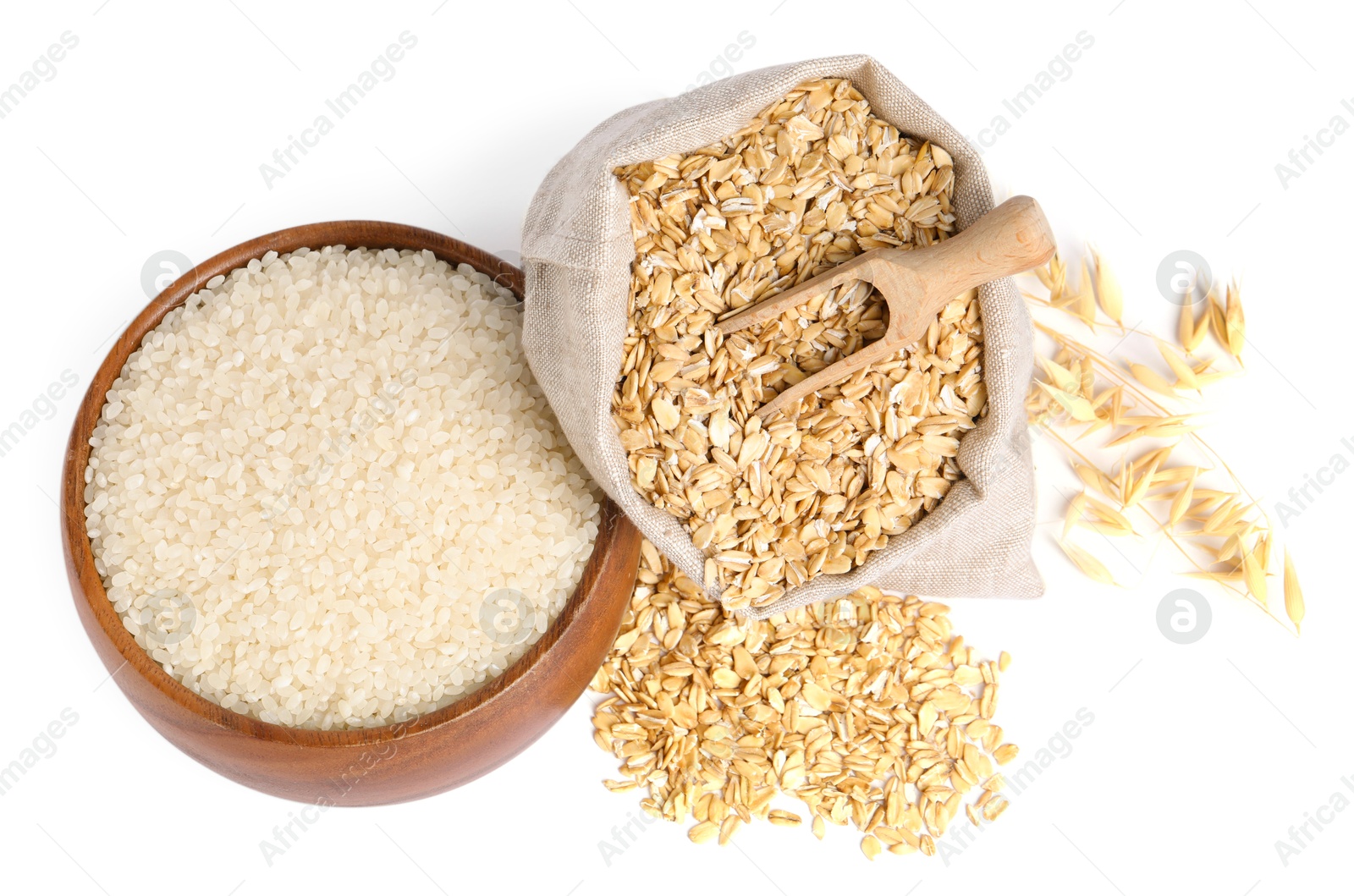 Photo of Different cereal grains and florets isolated on white, top view