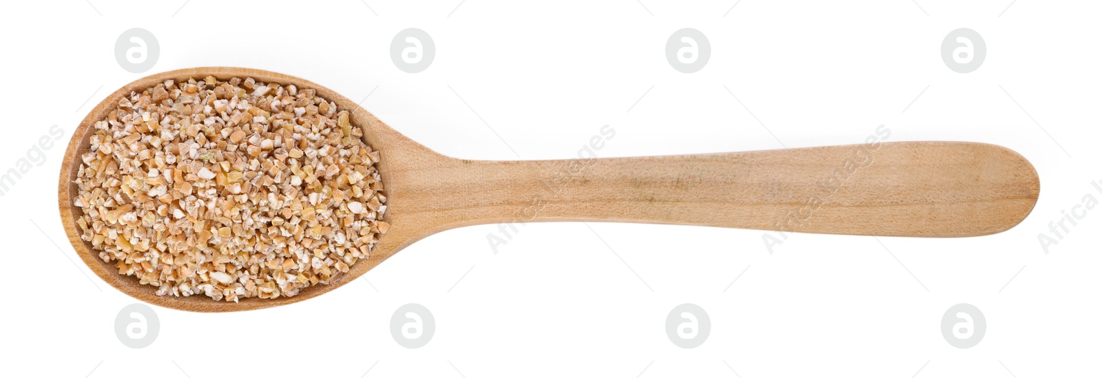 Photo of Dry wheat groats in wooden spoon isolated on white, top view