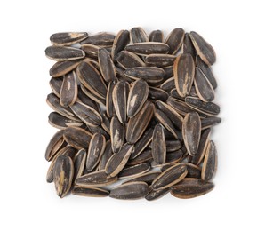 Photo of Pile of sunflower seeds isolated on white, top view