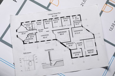 Photo of Papers with different engineering drawings, flat lay