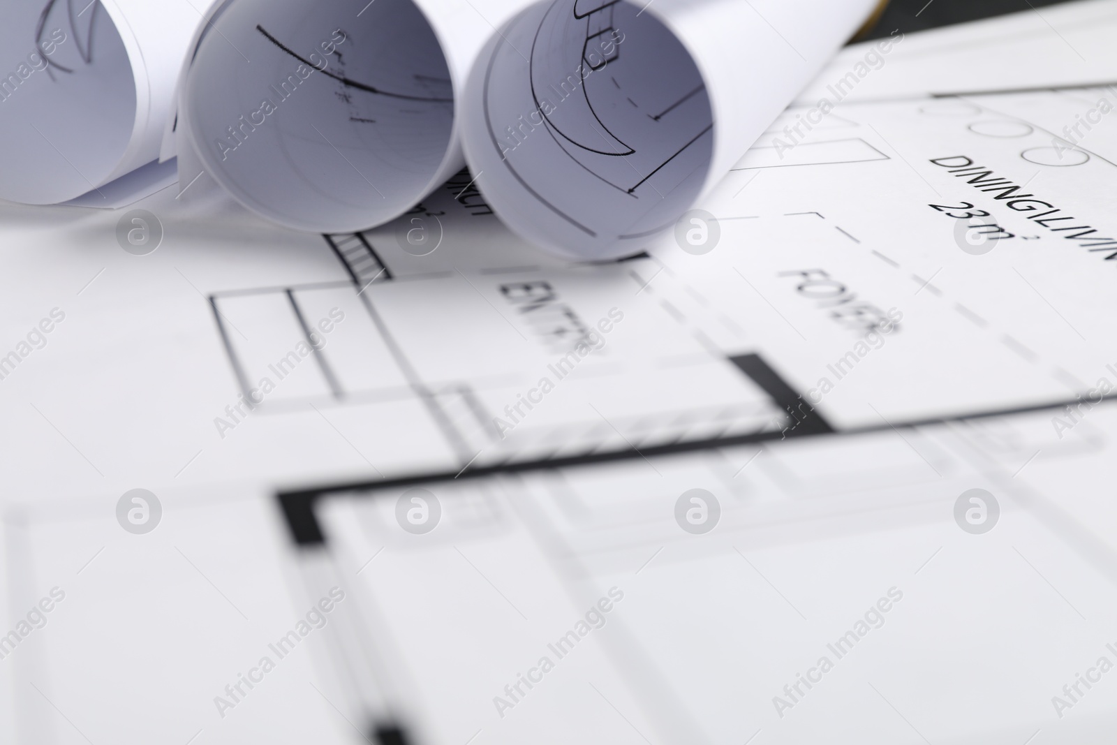 Photo of Different architectural drawings on table, closeup view