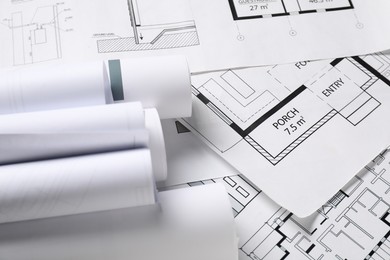 Photo of Different architectural drawings on table, closeup view