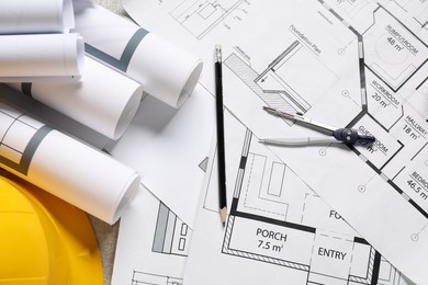 Photo of Different engineering drawings and tools on table, flat lay