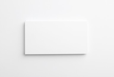 Photo of Blank business cards on light grey background, top view. Mockup for design