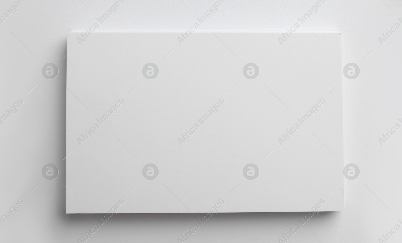 Photo of Blank business cards on light grey background, top view. Mockup for design