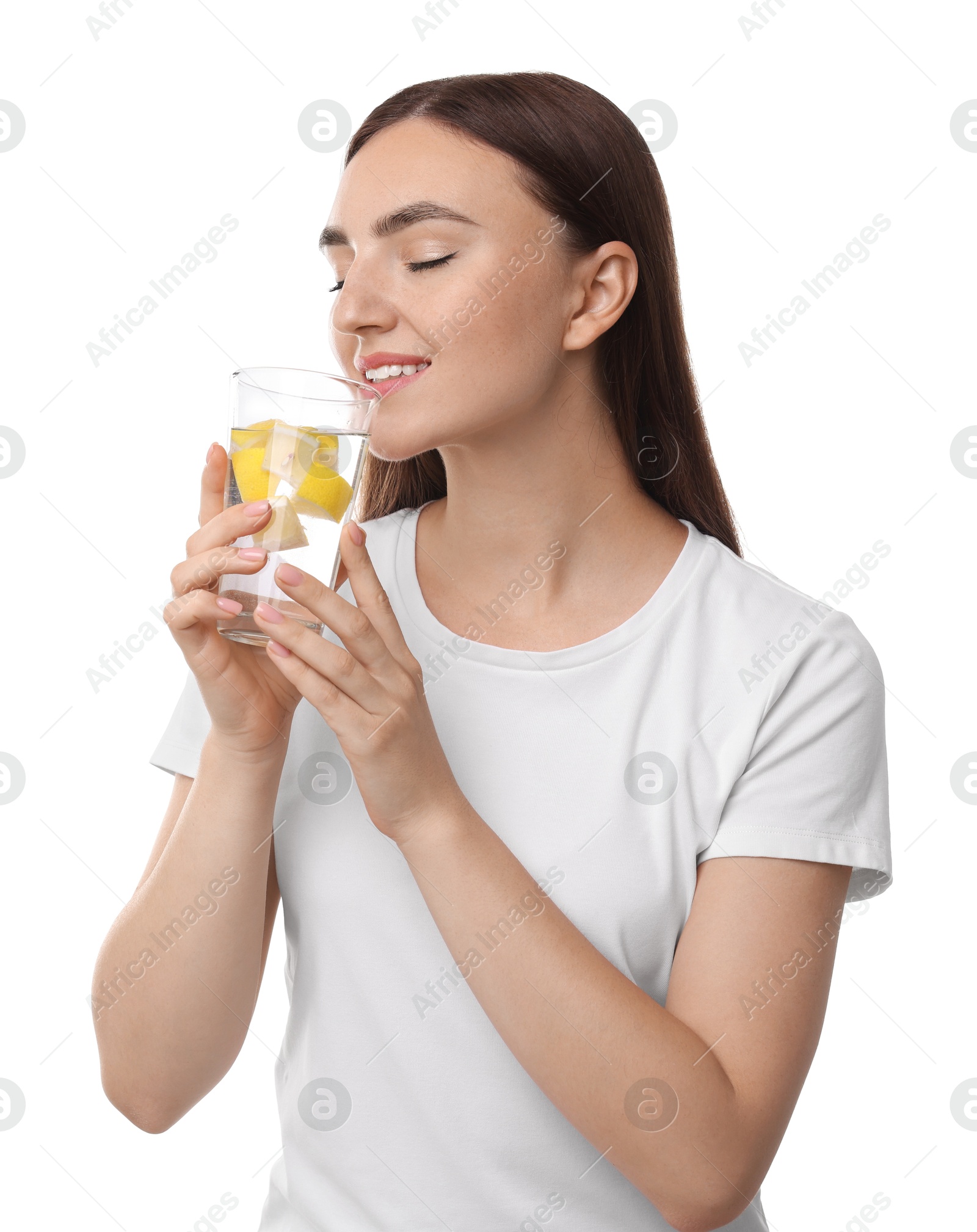 Photo of Woman drinking water with lemon on white background