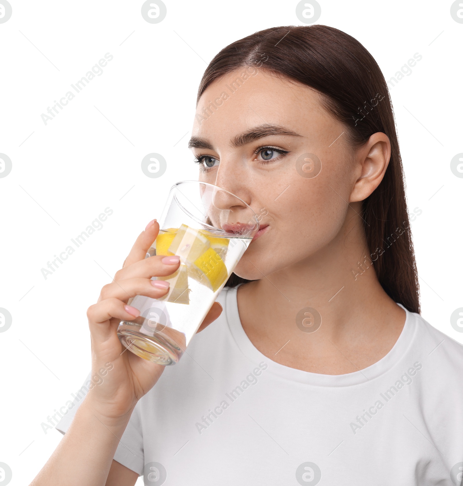 Photo of Woman drinking water with lemon on white background