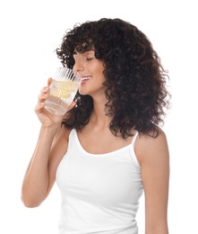 Photo of Woman drinking water with lemon on white background