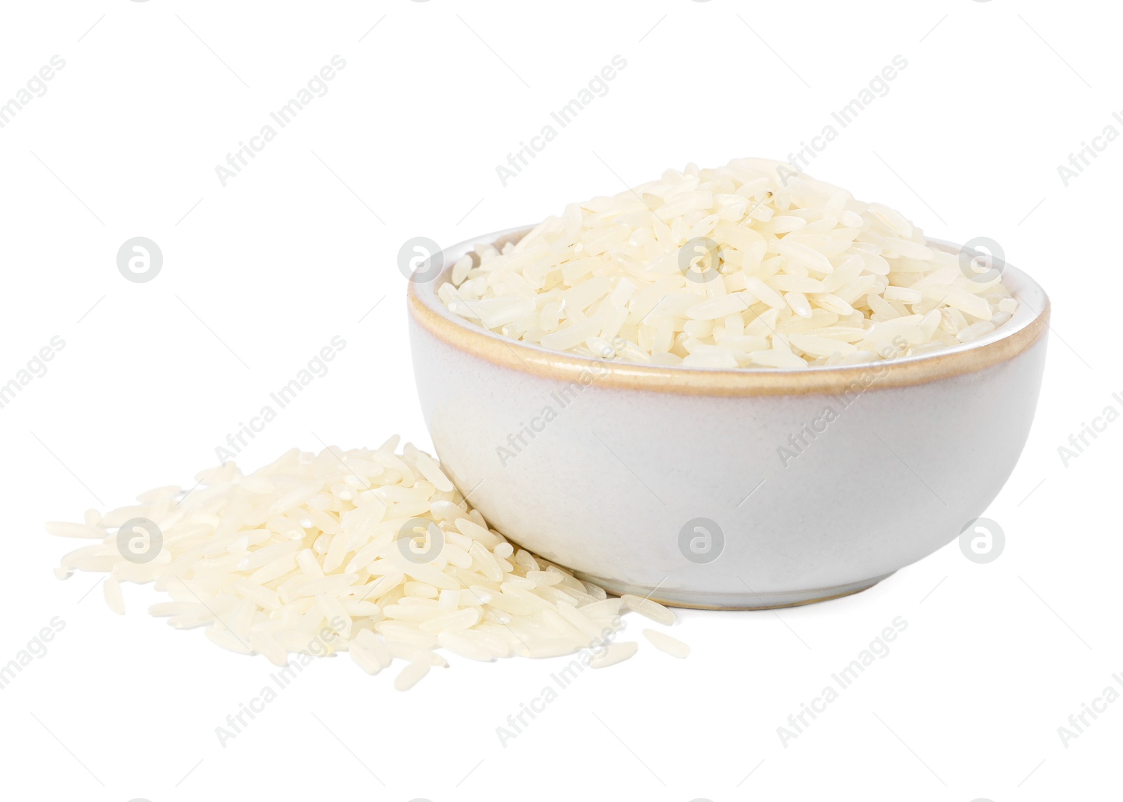 Photo of Raw rice in bowl isolated on white