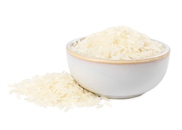 Photo of Raw rice in bowl isolated on white