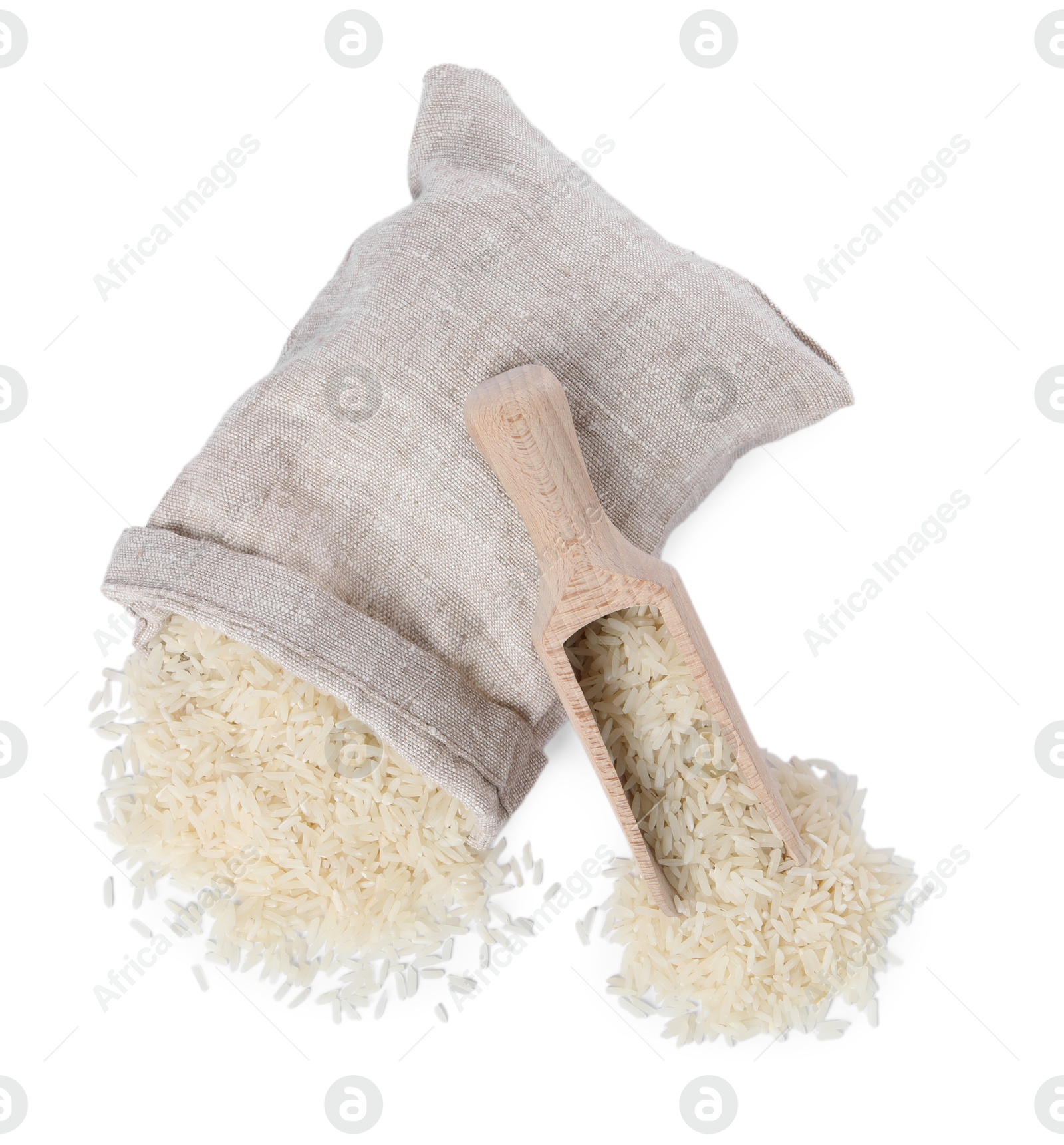 Photo of Raw rice in sack and scoop isolated on white, top view