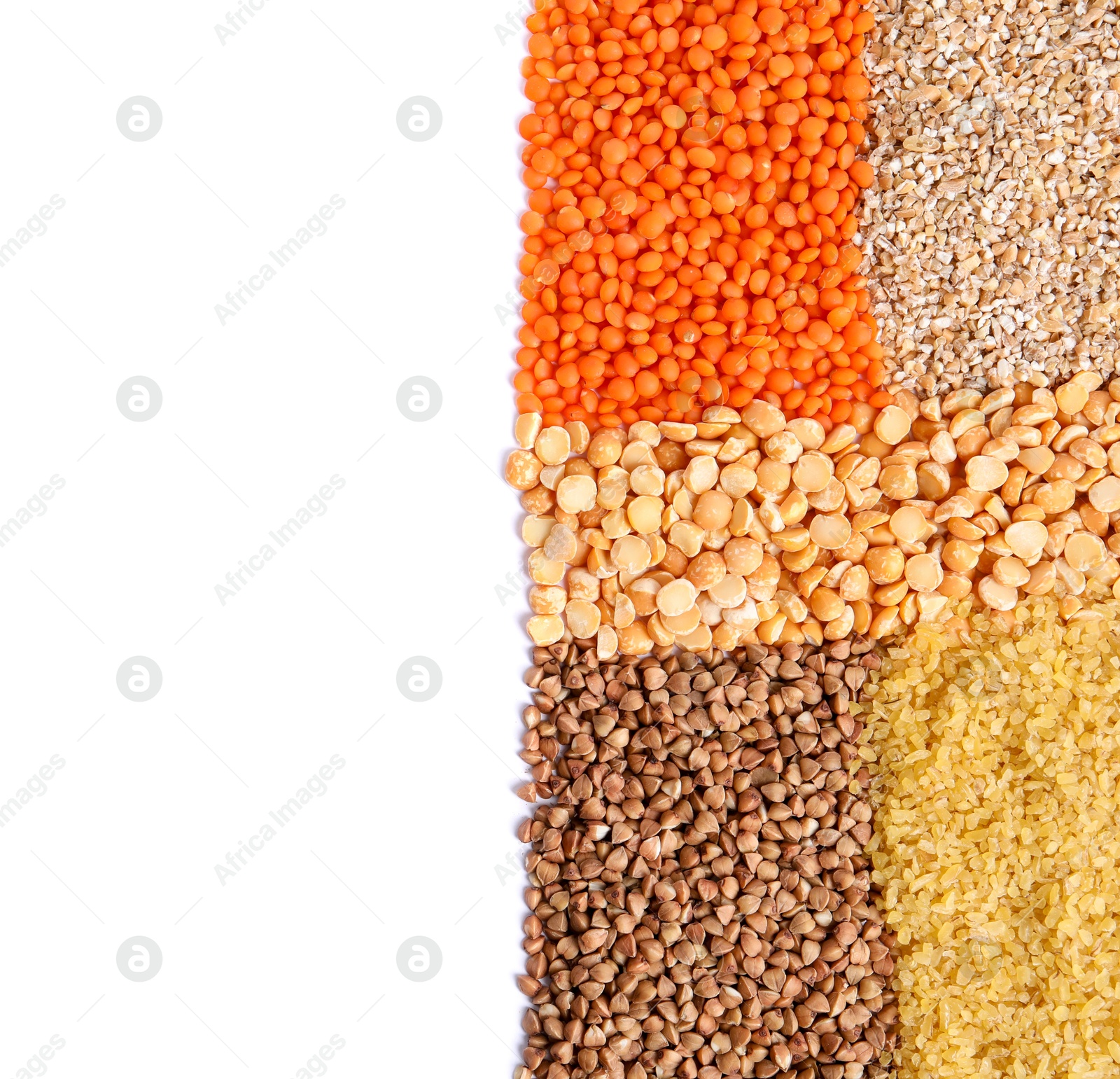 Photo of Piles of different cereals and legumes isolated on white, top view