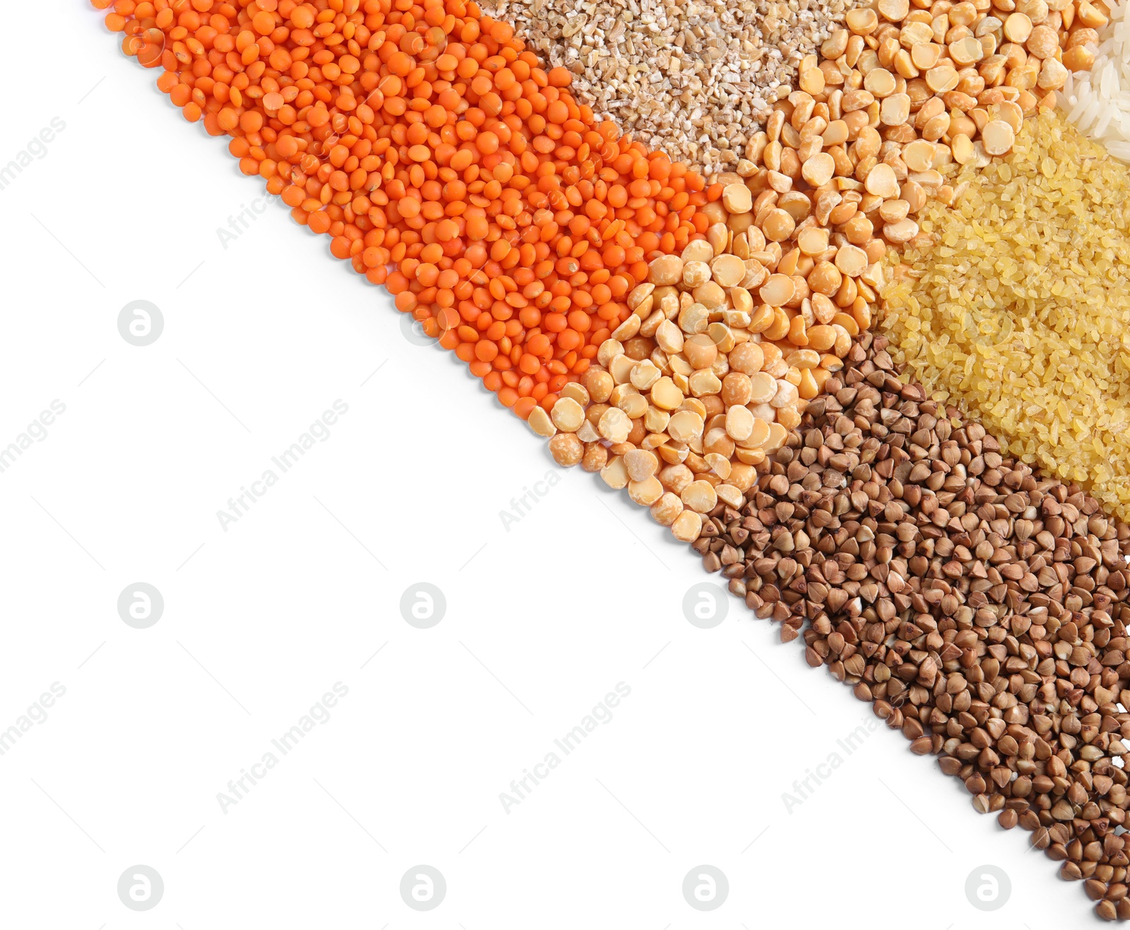 Photo of Piles of different cereals and legumes isolated on white, top view