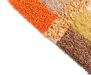 Photo of Piles of different cereals and legumes isolated on white, top view