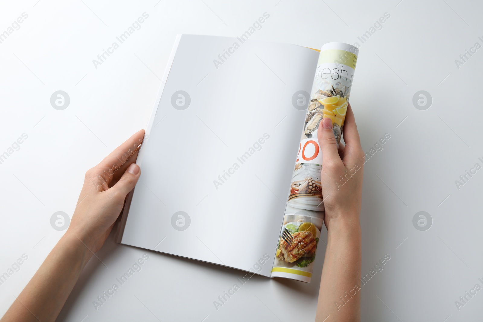 Photo of Woman reading magazine on white background, closeup. Mockup for design