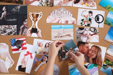 Photo of Woman creating vision board with different photos and other elements, top view