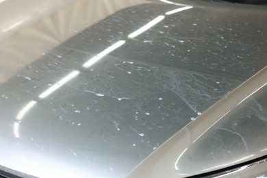 Photo of Modern auto with dirty stains, closeup view