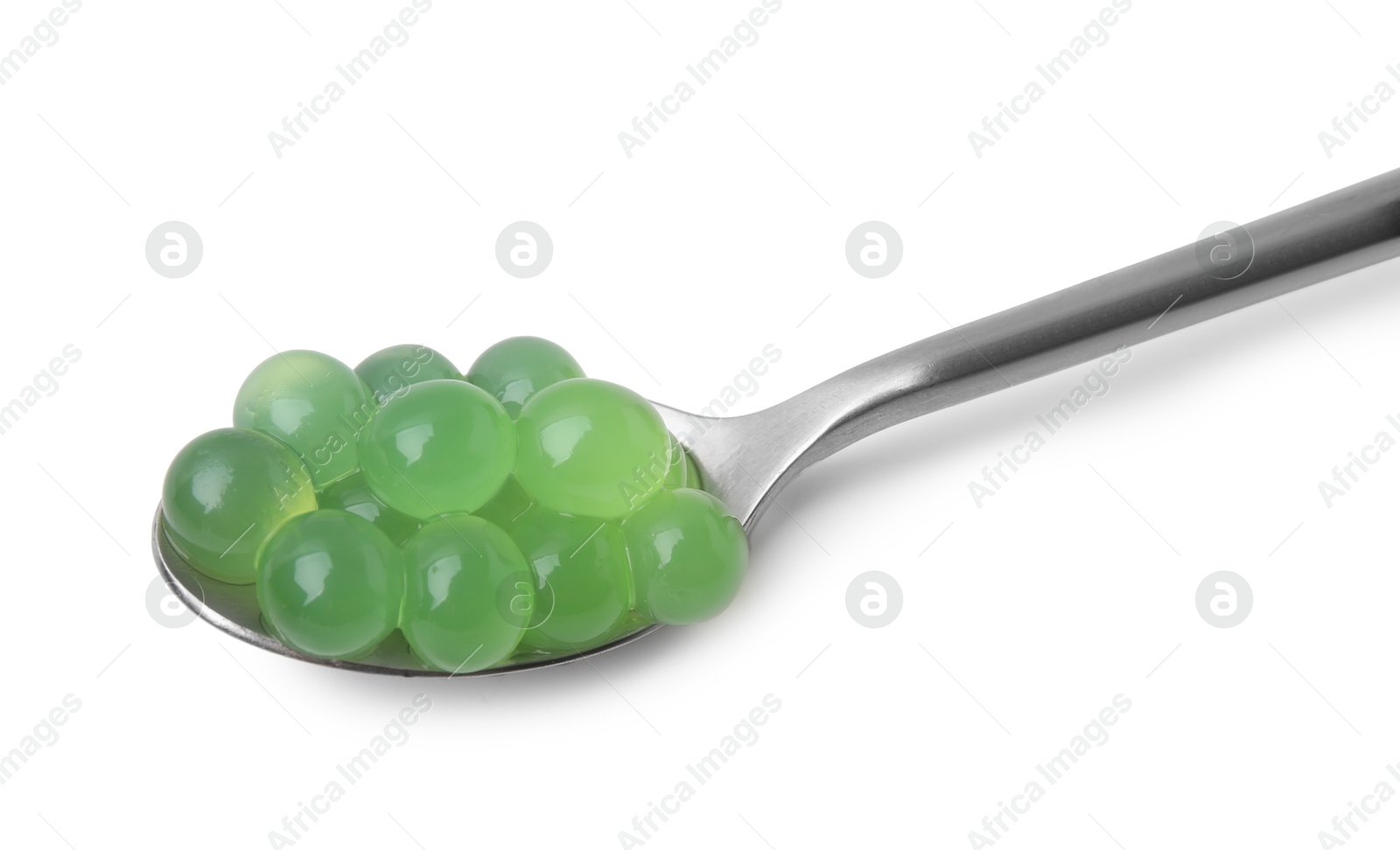 Photo of Bright tapioca pearls in spoon isolated on white