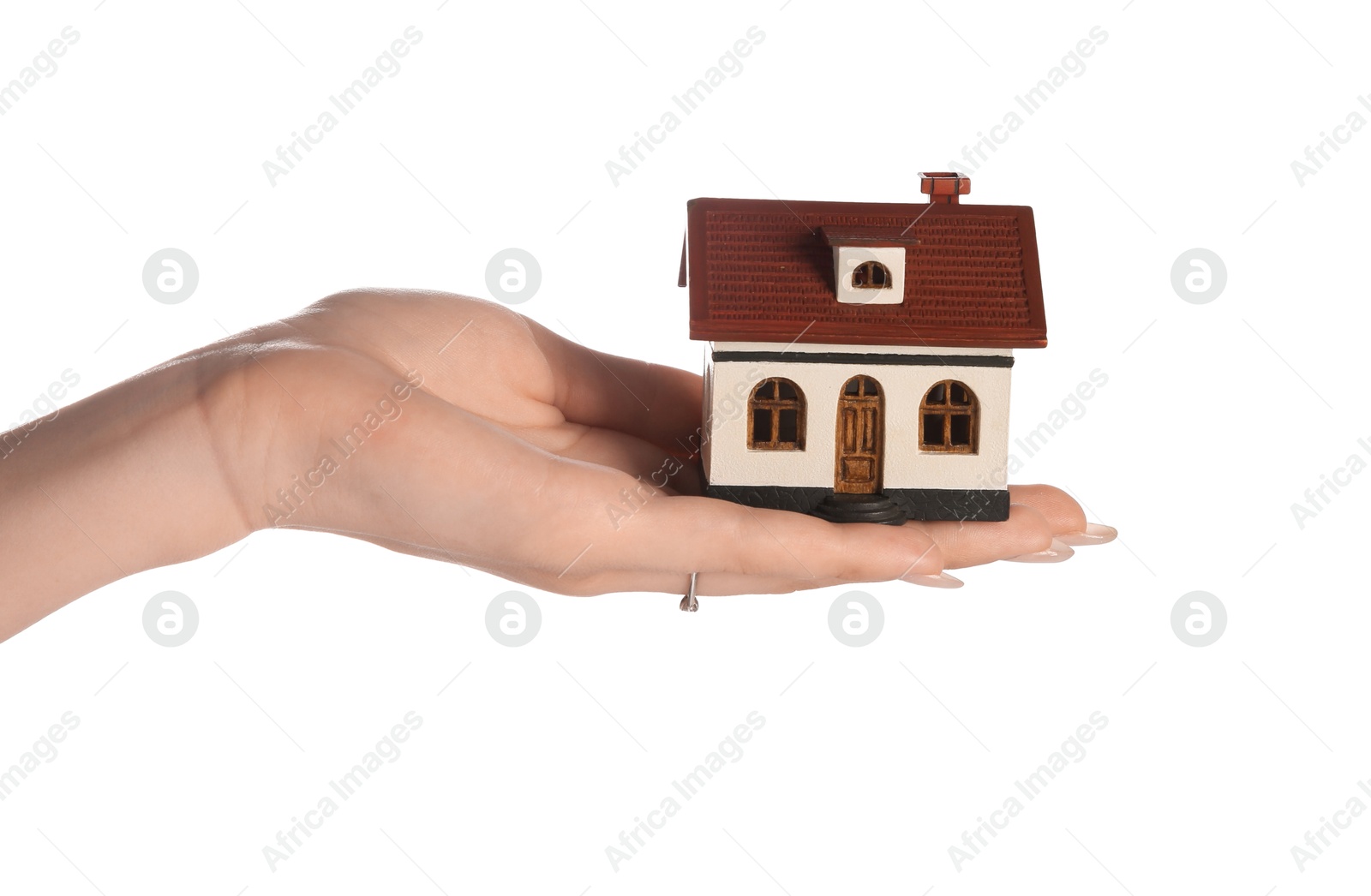 Photo of Woman holding house model on white background, closeup