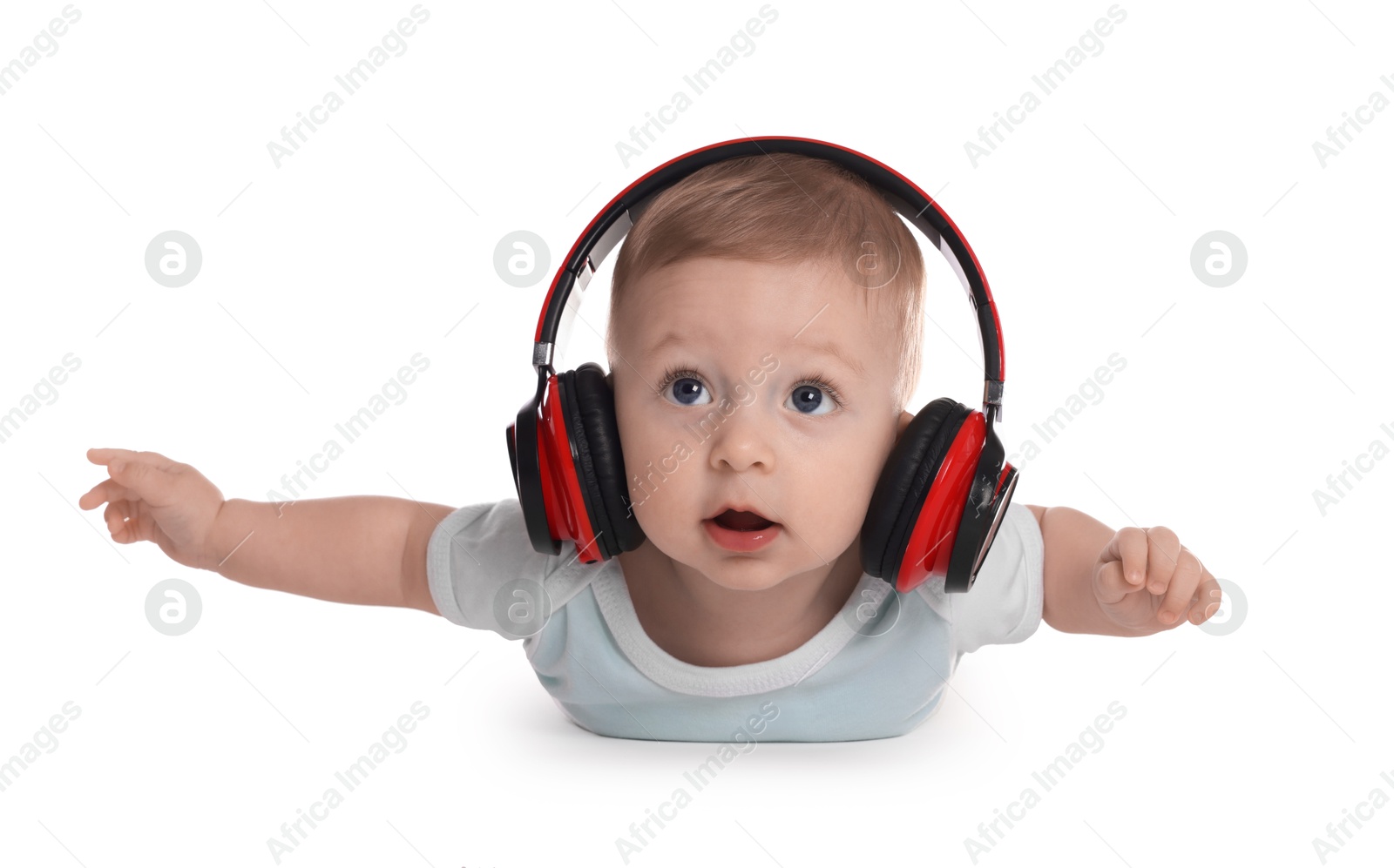 Photo of Cute little baby with headphones on white background