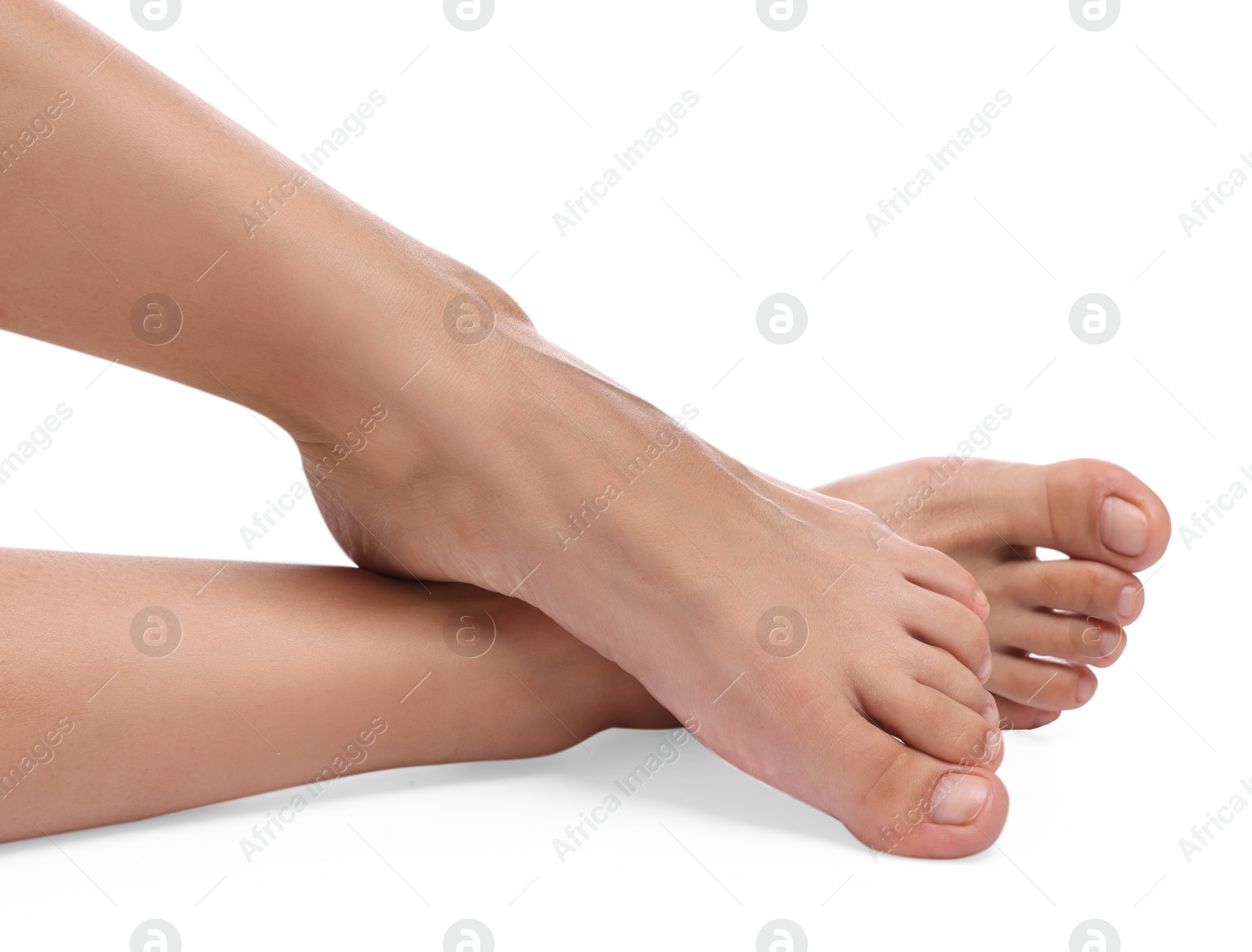 Photo of Woman with smooth feet on white background, closeup