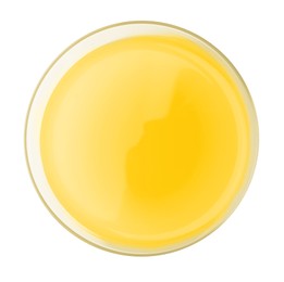 Photo of Tasty pineapple juice in glass isolated on white, top view