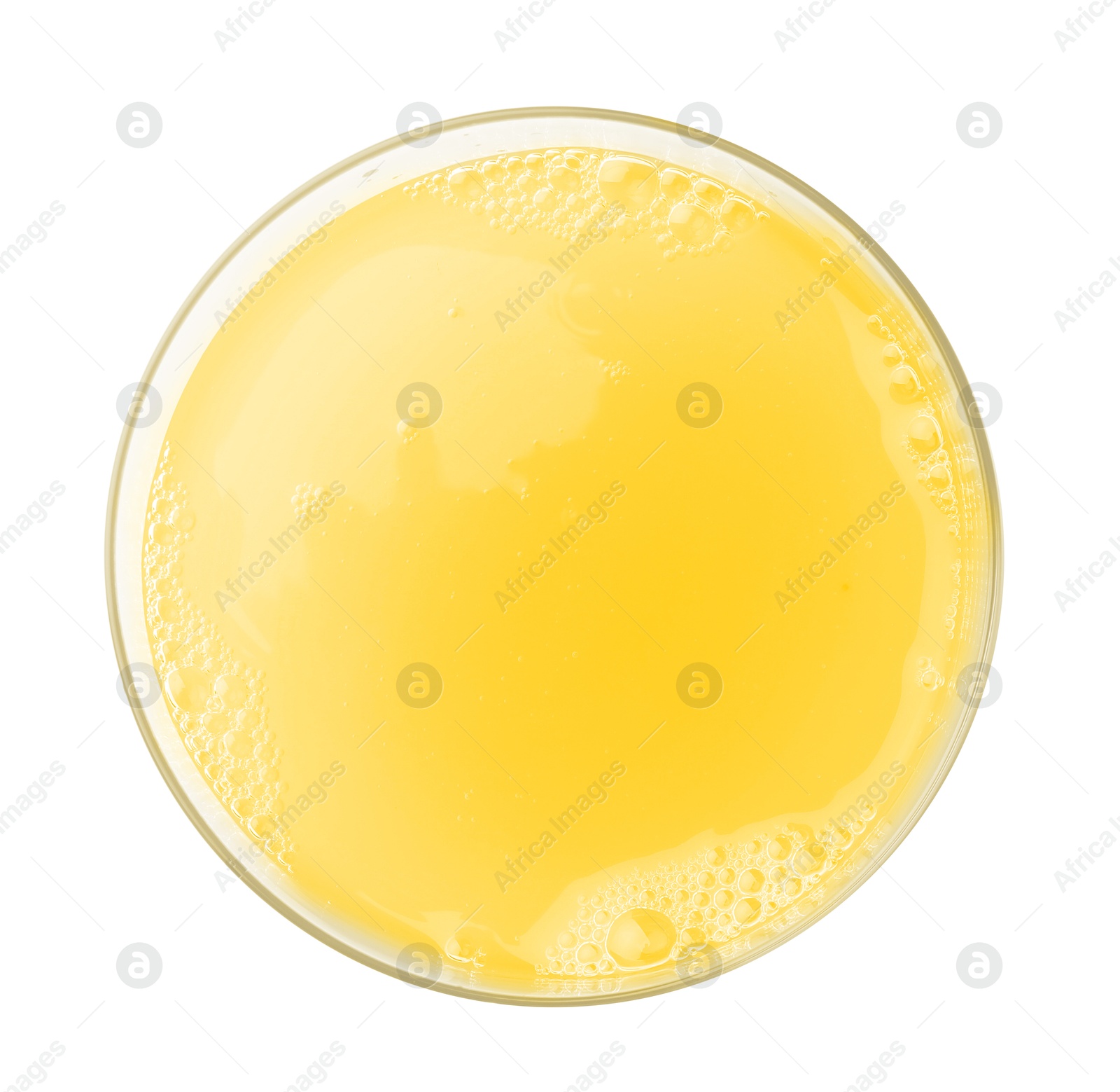 Photo of Tasty pineapple juice in glass isolated on white, top view