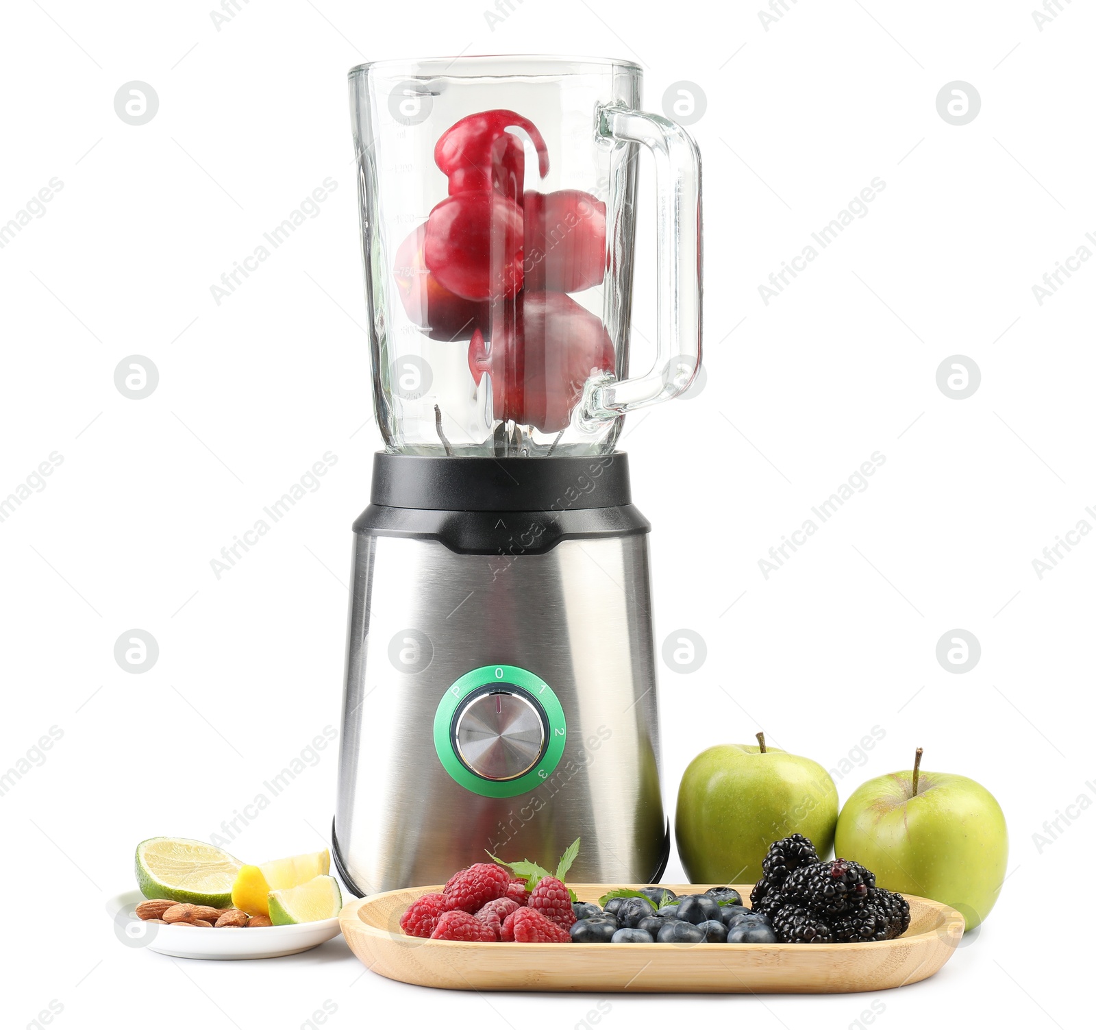 Photo of Blender and fresh ingredients isolated on white