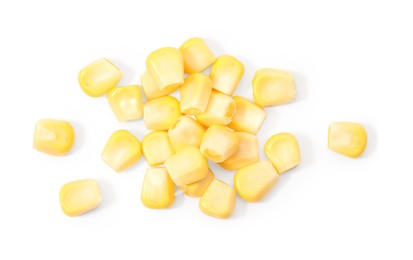 Photo of Pile of fresh corn kernels on white background, top view