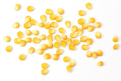 Photo of Many fresh corn kernels on white background, flat lay