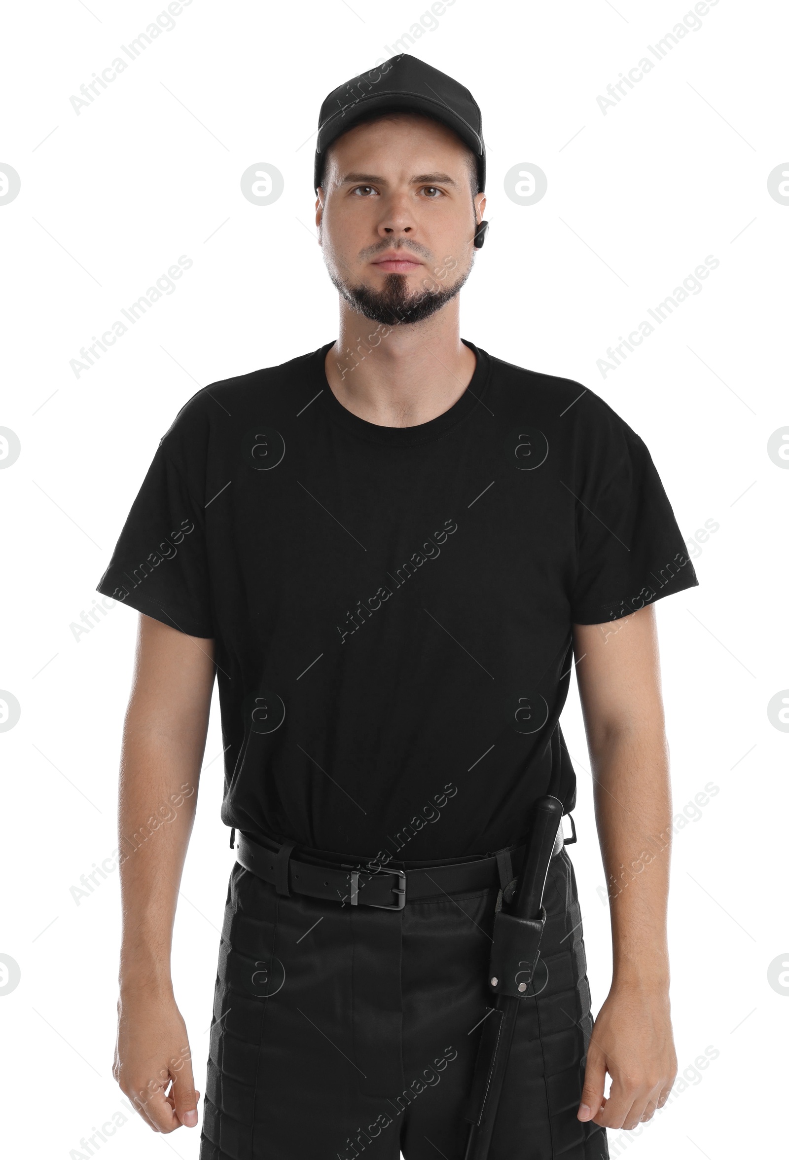 Photo of Young bodyguard with baton and earpiece isolated on white