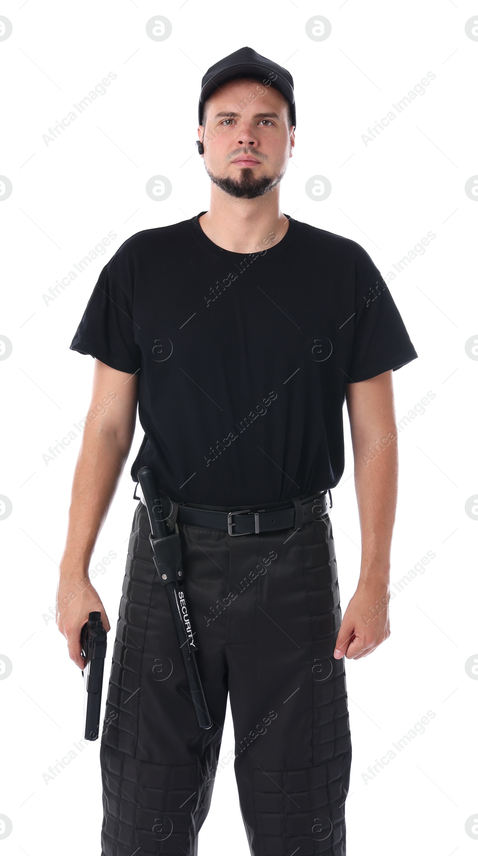 Photo of Young bodyguard with gun isolated on white