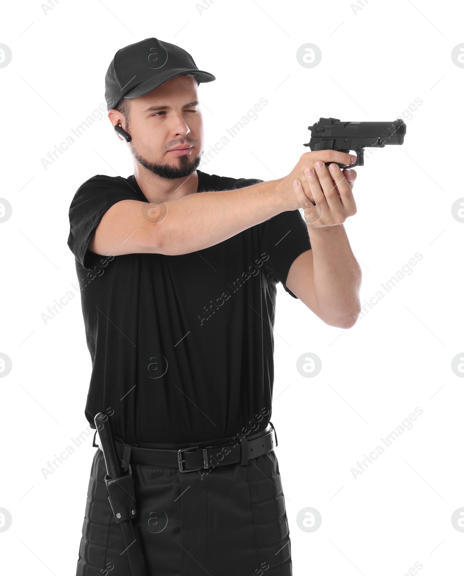 Photo of Young bodyguard using gun on white background