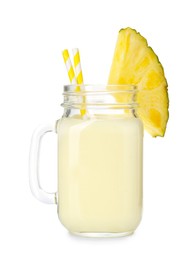 Photo of Tasty pineapple smoothie in mason jar and slice of fruit isolated on white