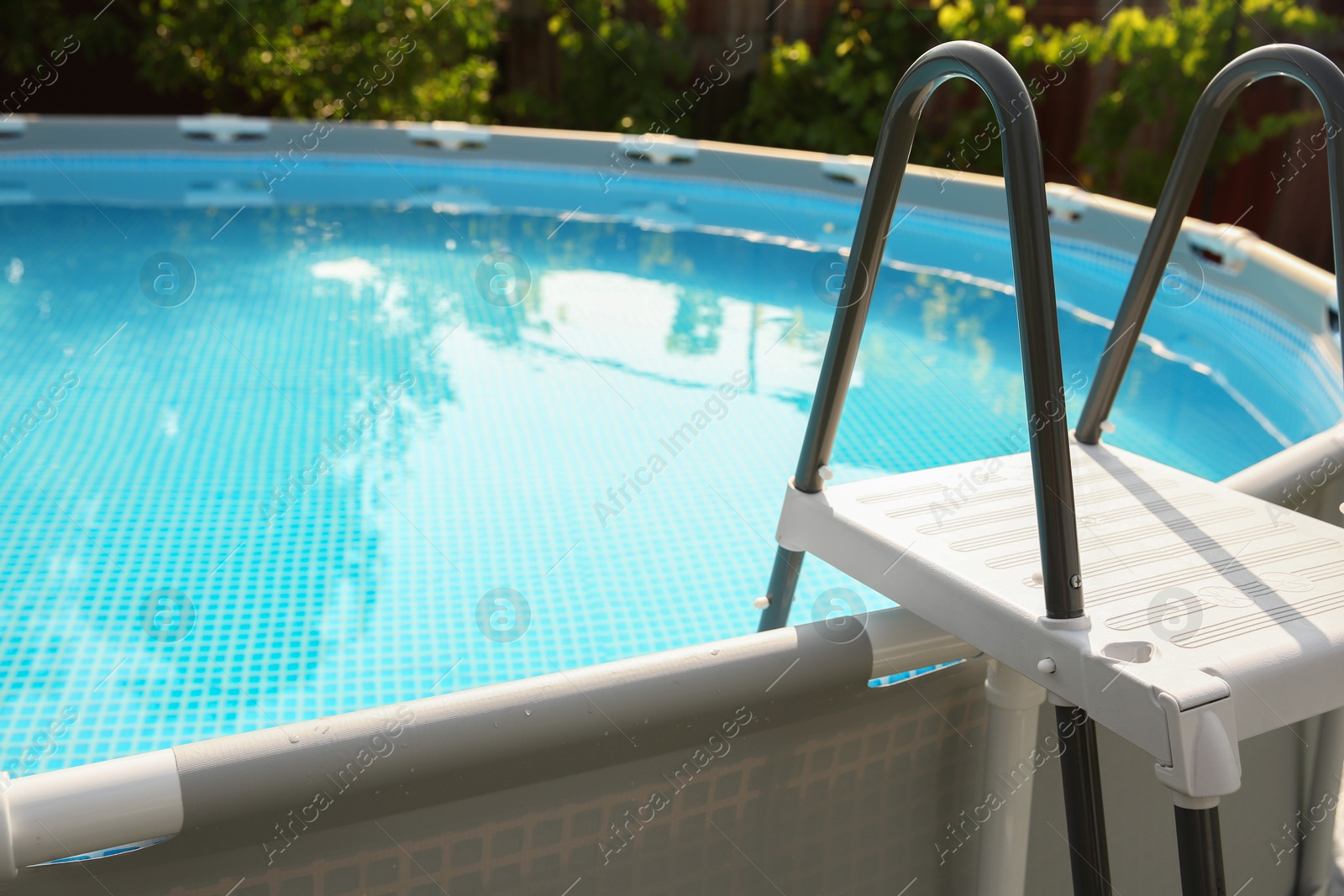 Photo of Above ground swimming pool outdoors on sunny day, closeup