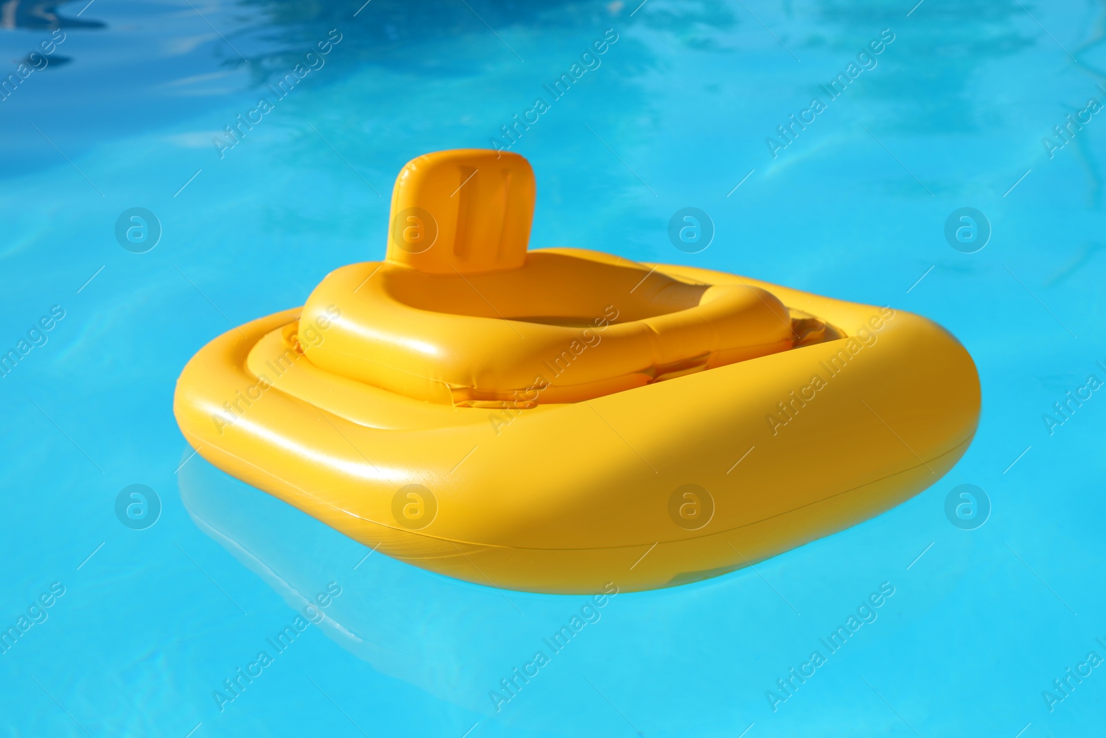 Photo of Yellow float in swimming pool at luxury resort