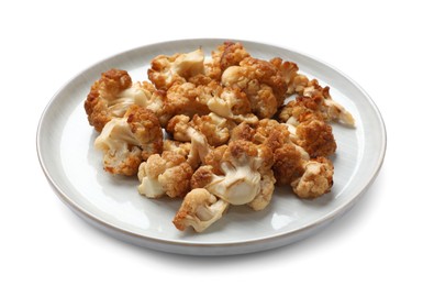 Plate with baked cauliflower on white background