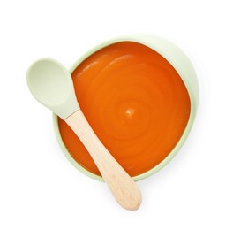 Photo of Tasty baby food in bowl and spoon isolated on white, top view