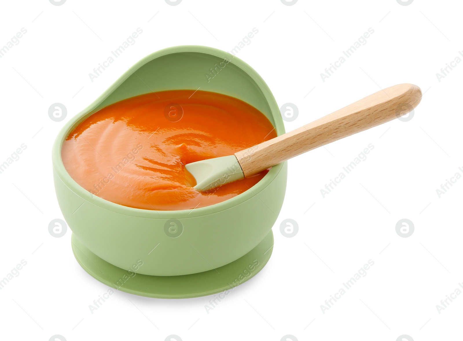 Photo of Tasty baby food and spoon in bowl isolated on white