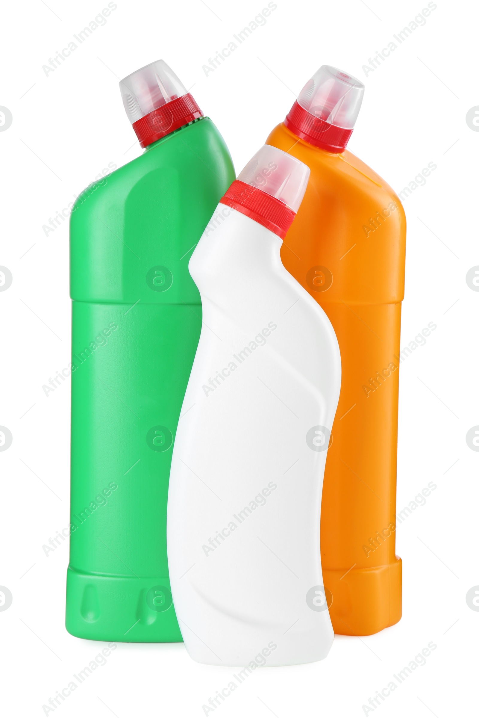 Photo of Different toilet cleaners in bottles isolated on white